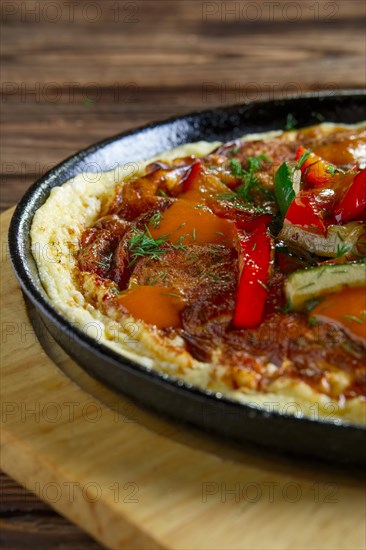 Omelette with paprika and zucchini. Rural breakfast