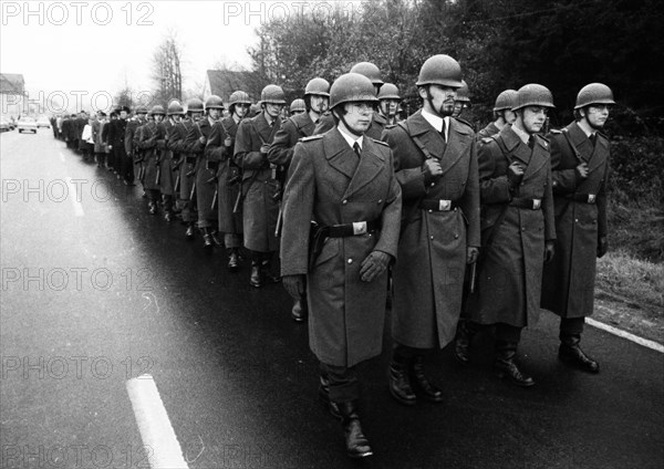 A meeting of the traditional associations of the Waffen- SS to honour their dead of the 6th SS Division North on 14. 11. 1971 in Hunrueck was accompanied by the Bundeswehr with officers and a squad of...
