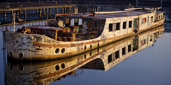 Shipwreck of the MS Dr. Ingrid Wengler in the Spree in early morning light