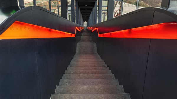 Dark illuminated staircase downwards