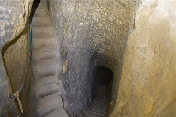 Staircase carved out of the sandstone inside the rock castle Valecov
