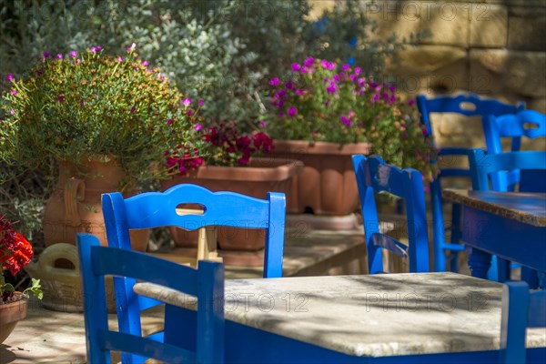 Blue tables and chairs in a cafe