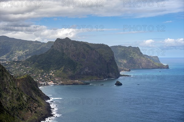 View of steep rocky coast and sea
