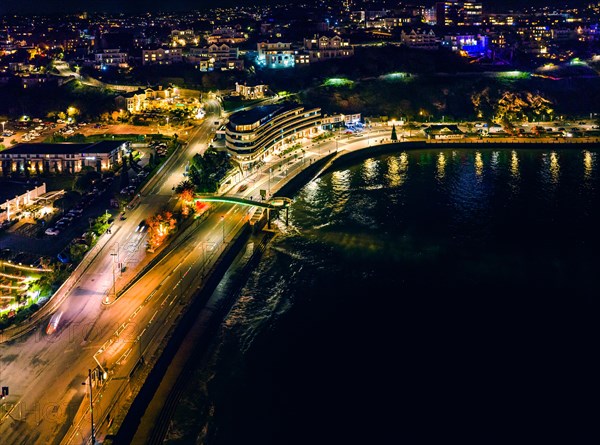 Night over Torbay Road and Torre Abbey Sands from a drone