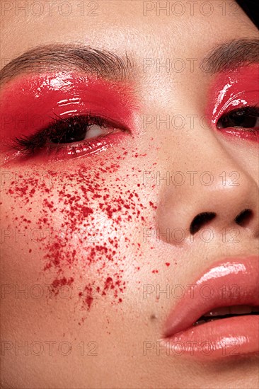 Closeup portrait of asian woman with creative makeup