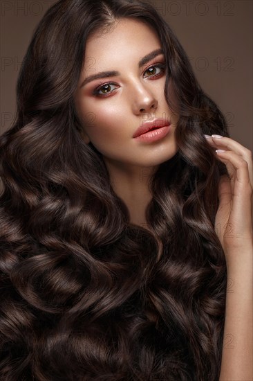 Beautiful brunette model with curls
