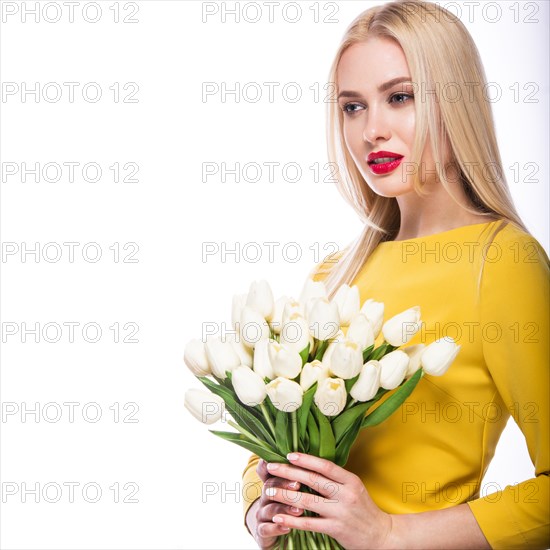 Portrait of beautiful fashion model with bouquet lily in hands