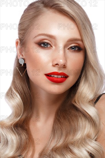 Beautiful blonde in a Hollywood manner with curls