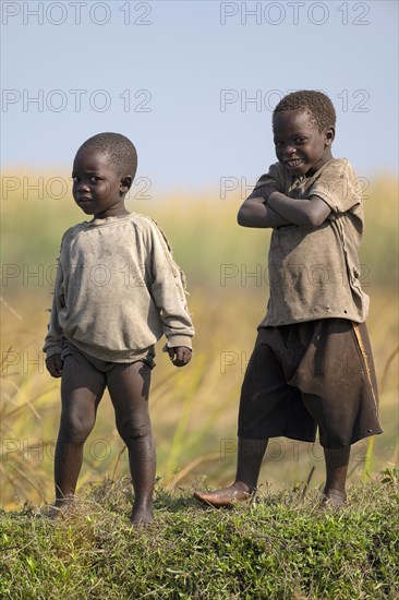 Children look on laughing