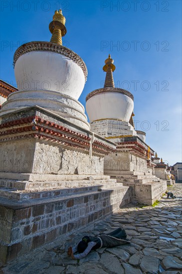 Pilgrim while praying in the Tashilhunpo monastery