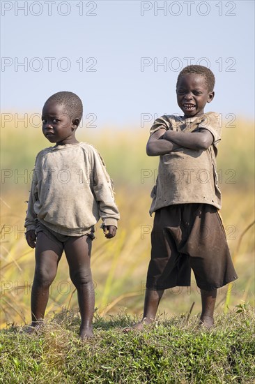 Children look on laughing