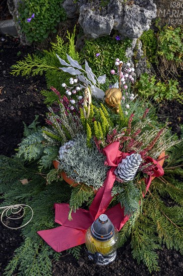 Grave with flower decoration