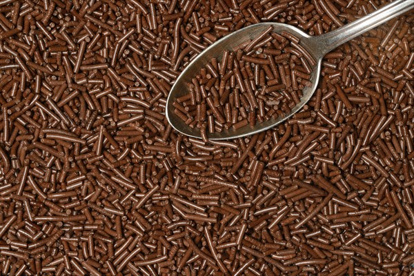 Chocolate sprinkles with teaspoon