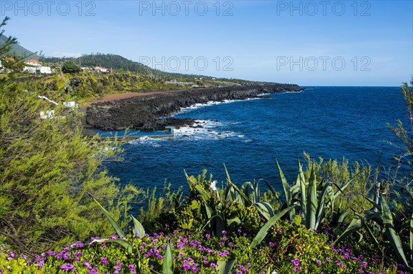Rocky volcanic coastline around Sao Mateus