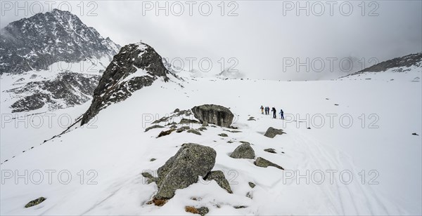 Group of ski tourers ascending Sommerwandferner