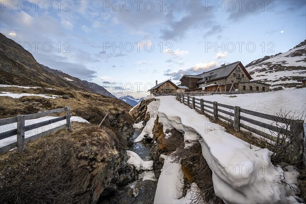 Oberbergbach gorge and Franz-Senn-Huette mountain hut in winter