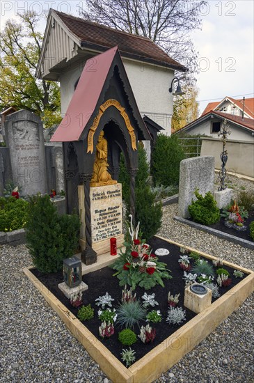 Grave with flower decoration
