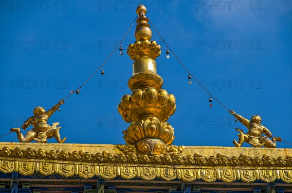 Buddhist roof decorations on the roof of the Tashilhunpo monastery