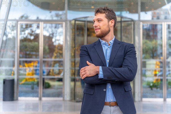 Portrait businessman CEO of a company at the entrance of the office
