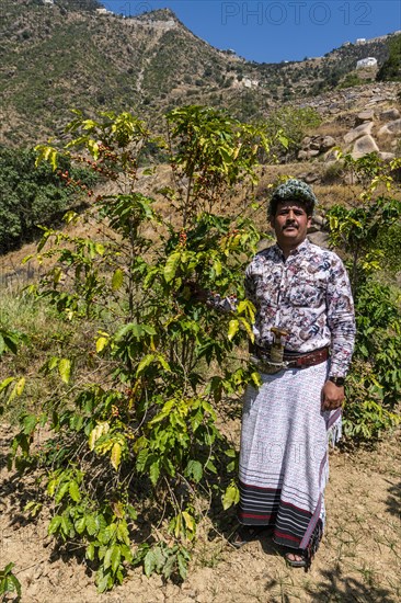 Traditional dressed man of the Qahtani Flower men tribe in the coffee plants