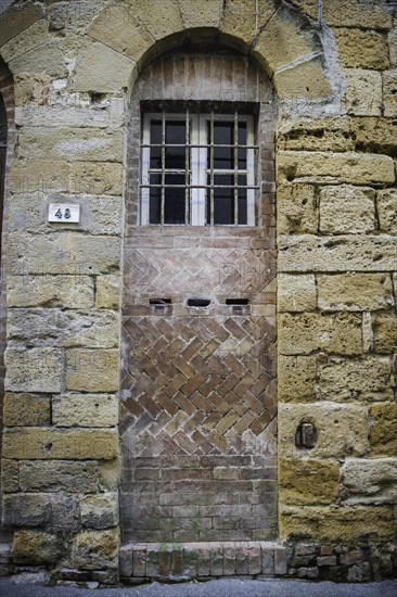 Doorway along cobbled street