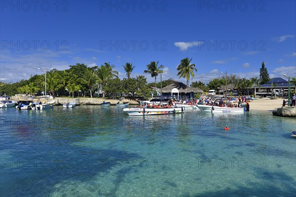 Tourists are taken in boats to Isla Saona