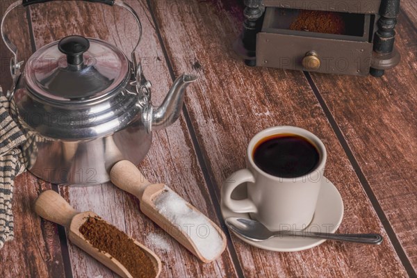 Coffee cup with milk jug