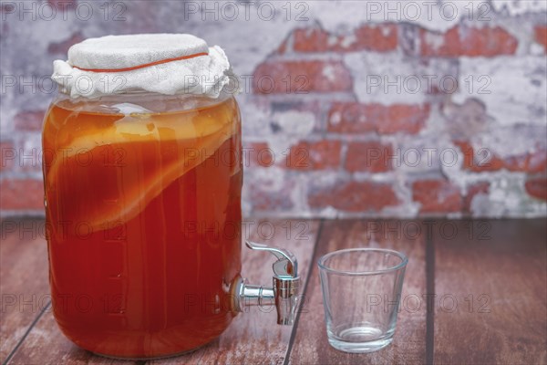 Glass jar with homemade kombucha
