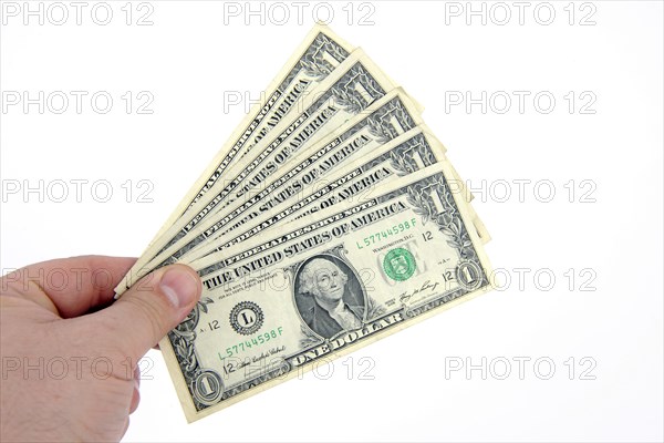 One dollar banknotes held as fans in one hand