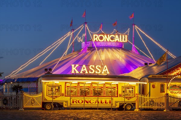 Circus Roncalli at dusk on the Buergerweide