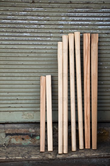 Wooden planks leaning on metal shutter in the view