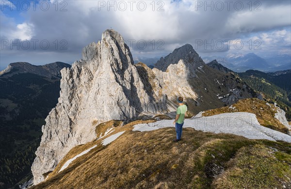 Hiker at the summit of Rote Flueh