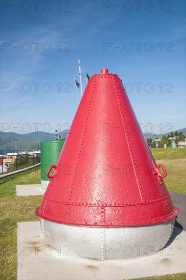 Large red marine buoy