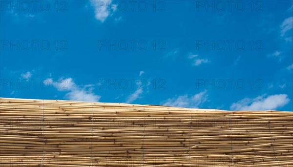 Mat made of straw used as a wall outdoors