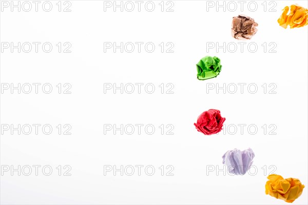 Colorful crumpled paper form a half circle shape
