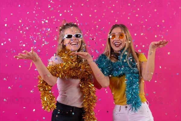 Two young blonde caucasian women partying