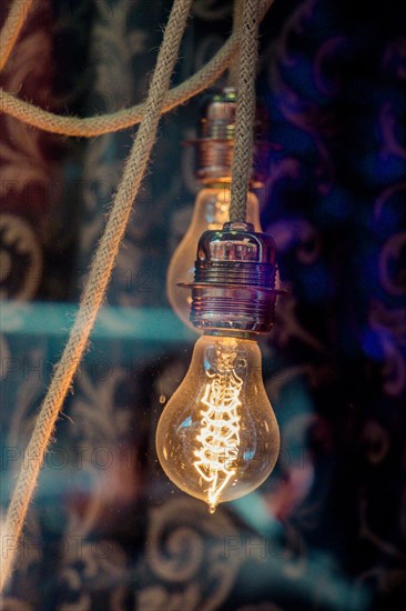 Decorative antique edison style filament light bulbs hanging