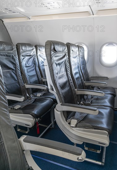 Empty rows of seats in a Lufthansa A320 aircraft