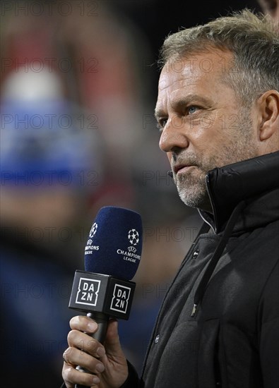 National coach Coach Hans-Dieter Hansi Flick interviewed by microphone Logo DAZN