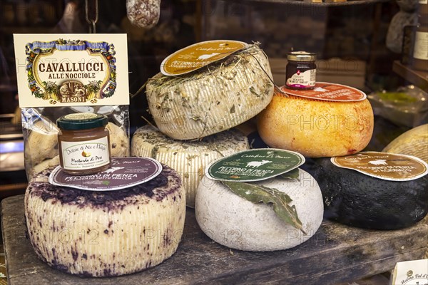 Cheese shop in the narrow streets of the old town of Pienza