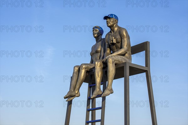 Bronze sculpture Soccoristas de Biarritz X-X by Aurora Canero in the dunes along the North Sea coast at Knokke-Heist