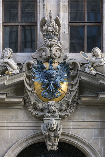 Imperial eagle and sculptures at the central entrance portal of the historic Wolf Town Hall