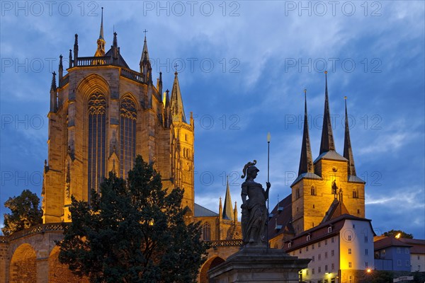 Erfurt Cathedral and Severi Church with Minerva Fountain in the evening