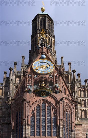Tower of the Church of Our Lady with clock and the Maennleinlaufen