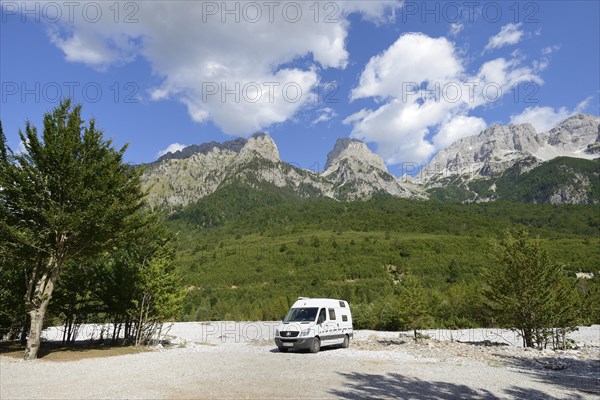 Camping bus on the dry riverbed of the Valbona