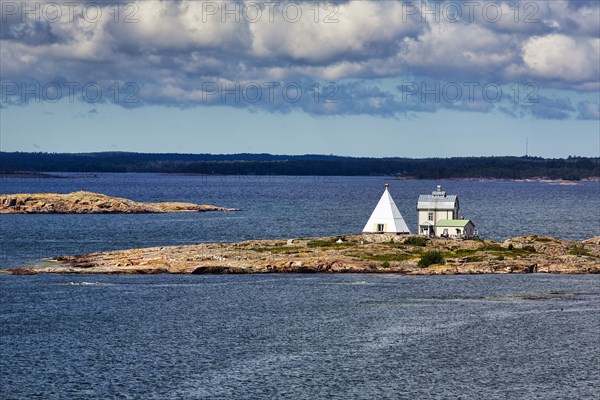 Old pilot station Kobba Klintar with museum, cafe and exhibition building in the shape of a pyramid, small island in the archipelago, harbour entrance Mariehamn, Aland Islands, Gulf of Bothnia, Baltic...