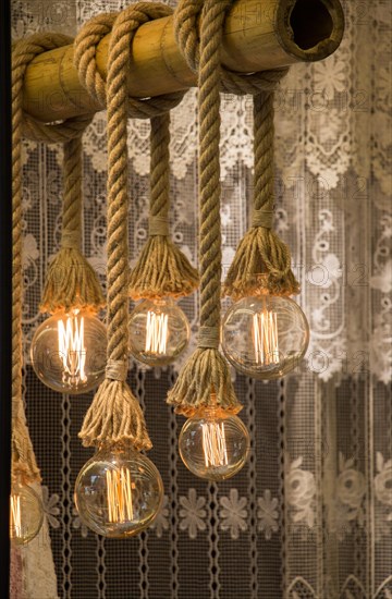 Decorative antique edison style filament light bulbs hanging