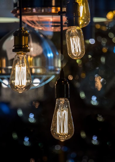 Decorative antique edison style filament light bulbs hanging