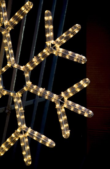 Christmas and party lights in the shape of a snowflake