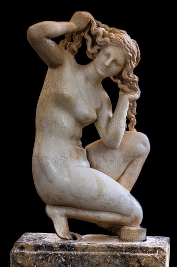 Small marble statue of Crouching Aphrodite from the Bath, known as Venus of Rhodes, 100 BC, Archaeological Museum in the former Order Hospital of the Knights of St John, 15th century, Old Town, Rhodes...